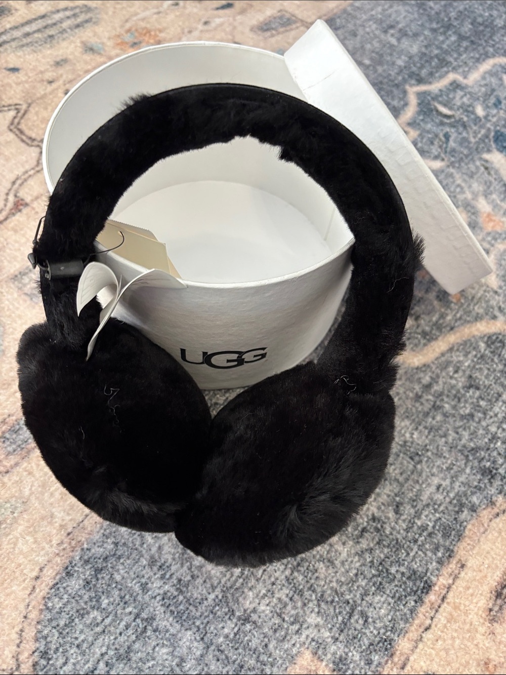 NWT. UGG Black Faux Fur earmuffs super soft!